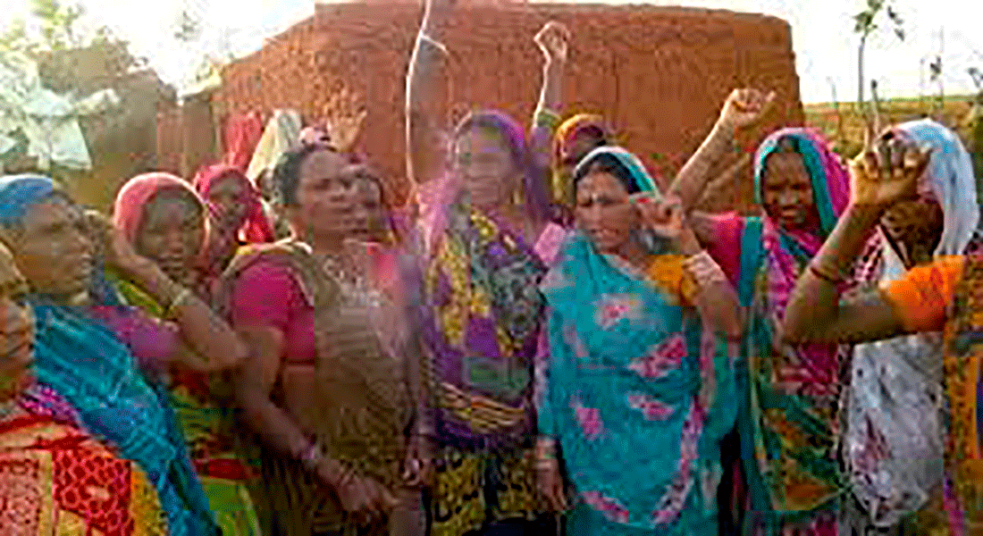 Members of the forest-dwelling community in Sonbhadra, Uttar Pradesh, burning the amendments proposed to the Land Acquisition Act, 2013 as an act of protest. 